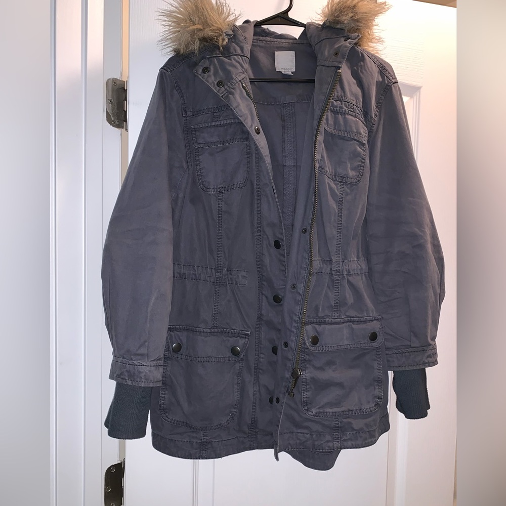 Navy blue parka with fur hood.